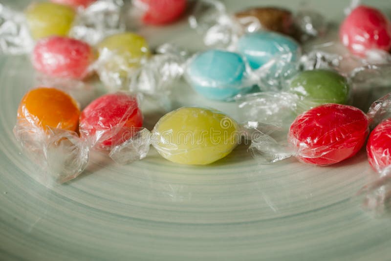 Heap of multicolor fruity candies as texture and background for design. Many different candies of different flavors. royalty free stock photos