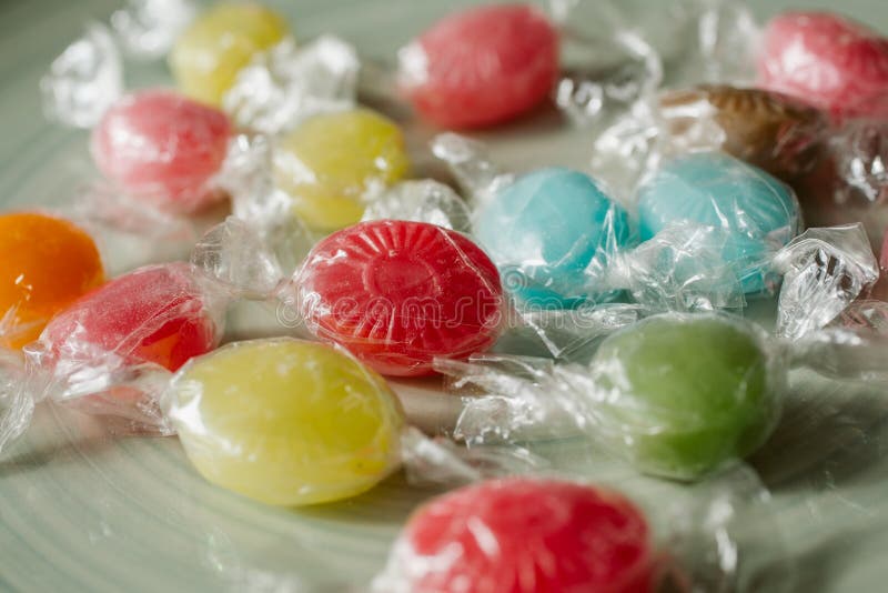 Heap of multicolor fruity candies as texture and background for design. Many different candies of different flavors. stock image