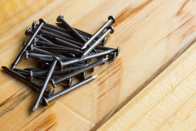 Heap of Nails on the Wooden Table Stock Image Image of table, work
