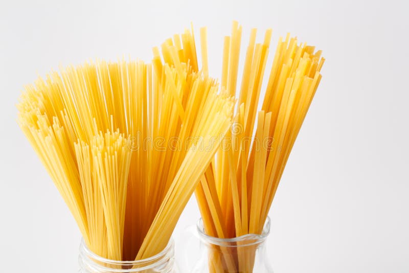 Heap Of Pasta Tied Up By A Rope Isolated On A White Background Stock ...