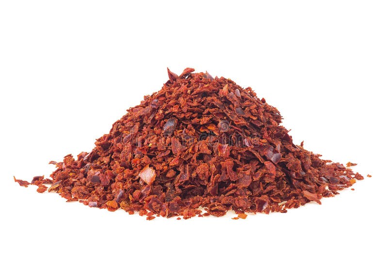 Heap of red pepper flakes isolated on white background. Pile crushed red pepper. Dried chili flakes