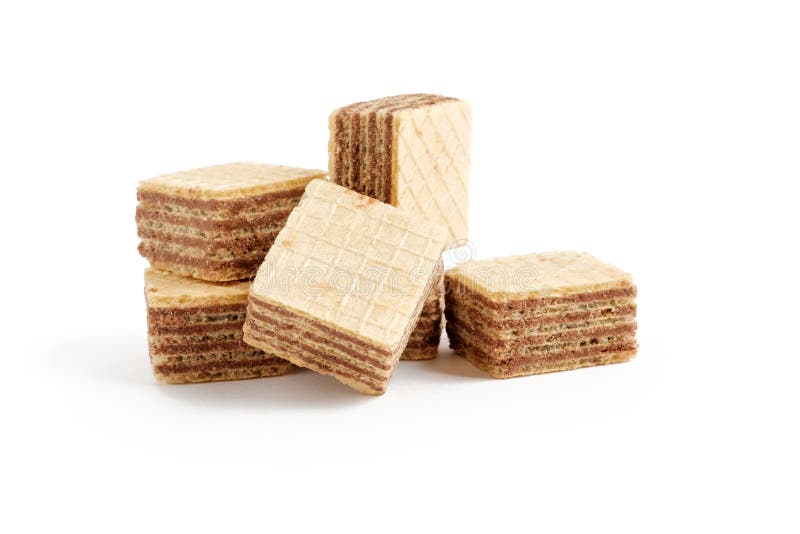 Heap of square wafer biscuits isolated on white