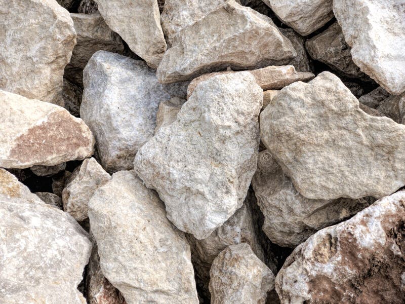 Heap of white limestone at construction site royalty free stock image