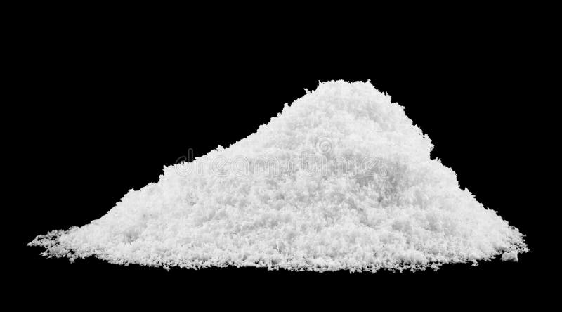 Heap of white snow isolated on black background