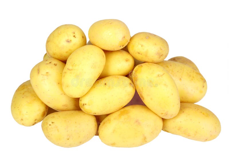 Heap of yellow raw potatos