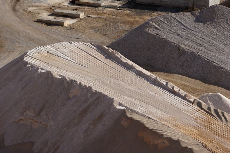 Heaps of stone aggregate for road construction royalty free stock images