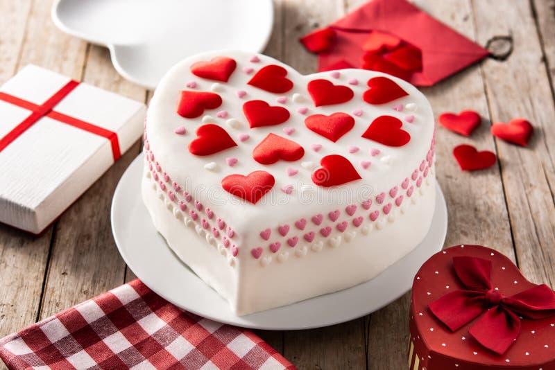 Heart cake for St. Valentine`s Day, Mother`s Day, or Birthday, decorated with sugar hearts