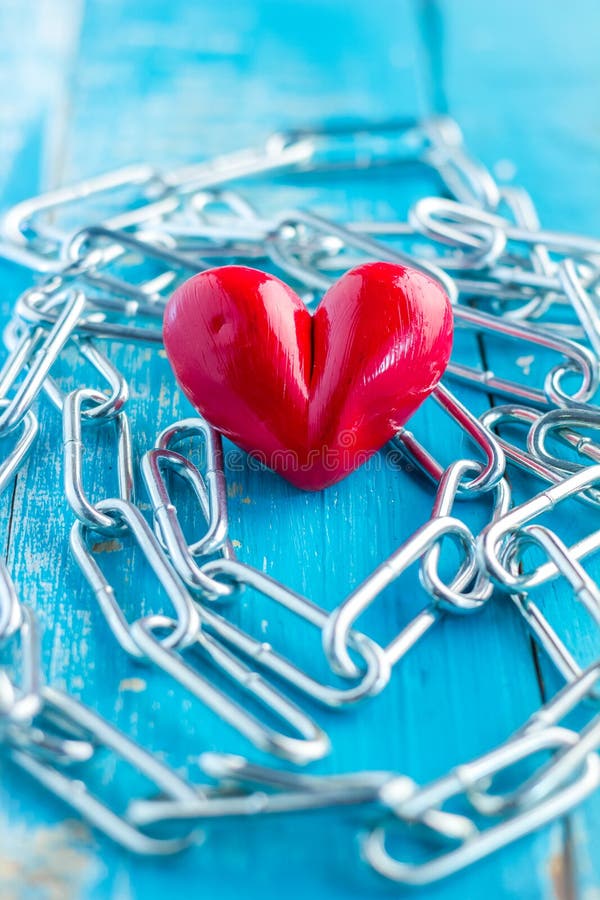 Heart with chains stock image. Image of jail, light, hand 65240237