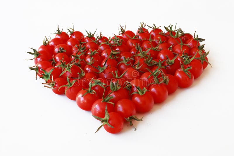 HEART of CHERRY TOMATOES stock photo. Image of tomatoes 76155968