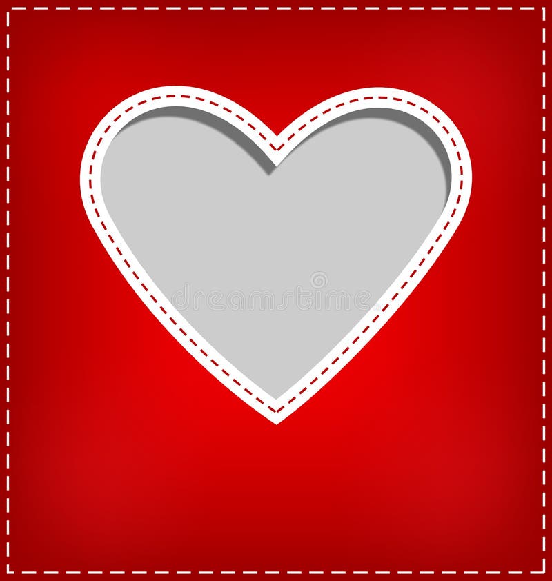 Heart cutout in red card on grey