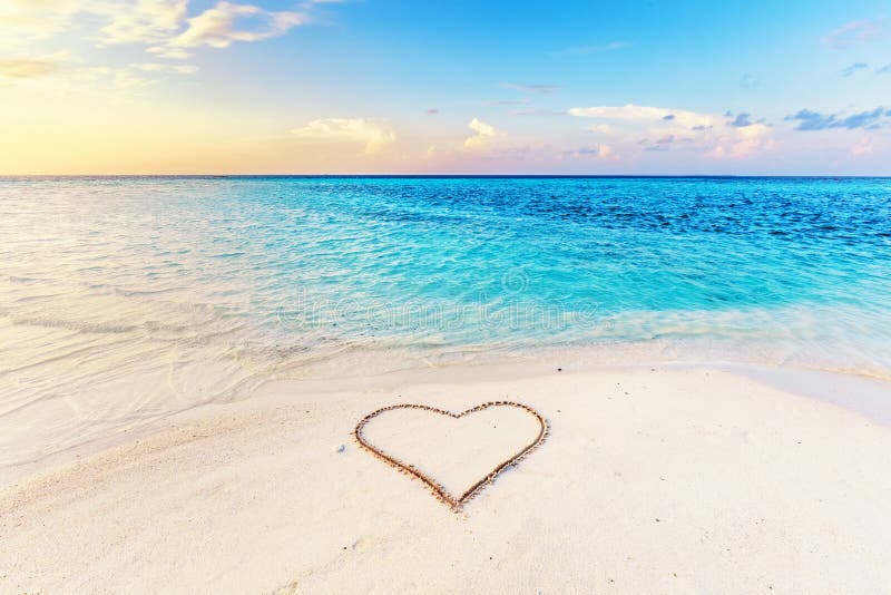 Heart Drawn on Sand of a Tropical Beach at Sunset. Stock Photo - Image Heart Drawn on Sand of a Tropical Beach at Sunset. Stock Photo - Image