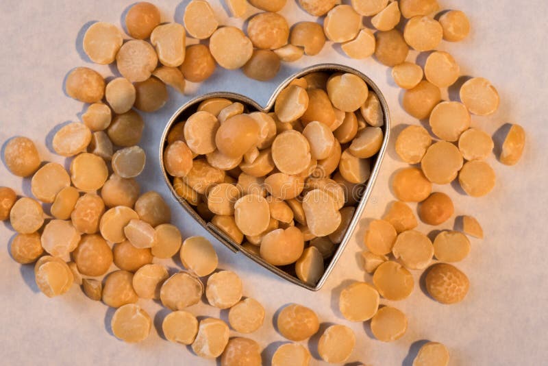 Yellow Split Peas In A Heart Shape Stock Image Image of food, legumes