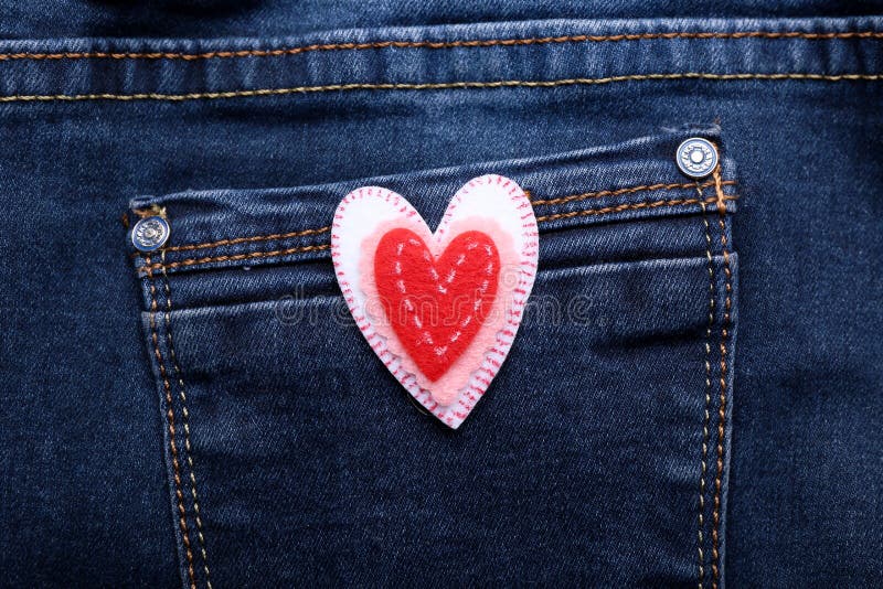 Red Heart On A Jeans Background. Valentines Day Background Consept