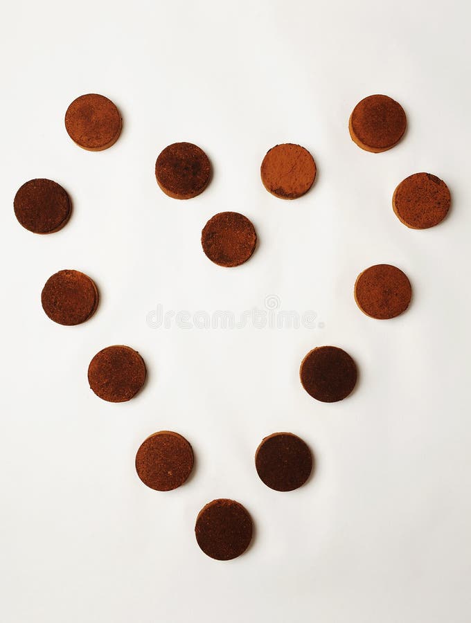 https://thumbs.dreamstime.com/b/heart-laid-out-espresso-coffee-pucks-white-background-isolated-top-view-208818090.jpg