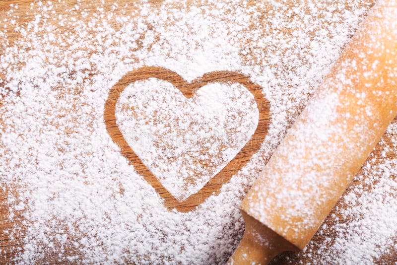 Heart made from flour stock photo