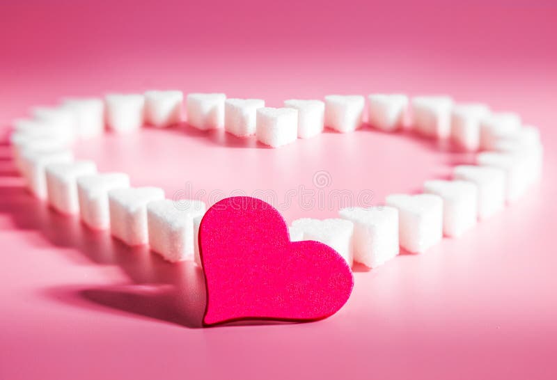 Heart Made of Sugar Cube Hearts on Pink Background, Selective Focus