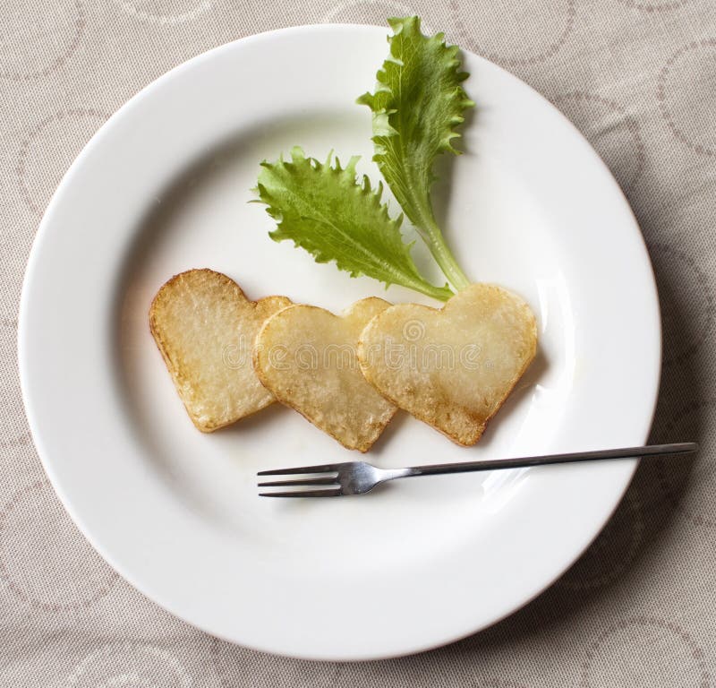 Heart shape chips stock image. Image of dish, french 33694225