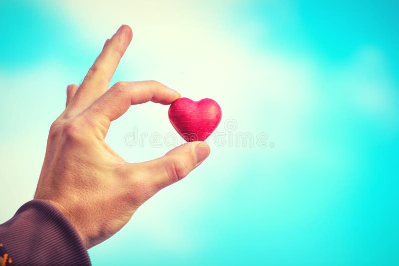 Heart shape love symbol in man hand Valentines Day Holiday royalty free stock image Heart shape love symbol in man hand Valentines Day Holiday royalty free stock image