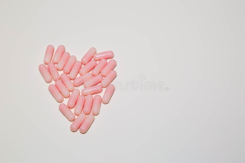 Heart Shape Made of Pink Capsule Pills Isolated on White Background Stock Image Image of