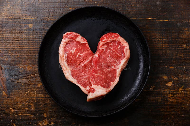 Heart shape Raw meat Steak stock image. Image of heart 71667803