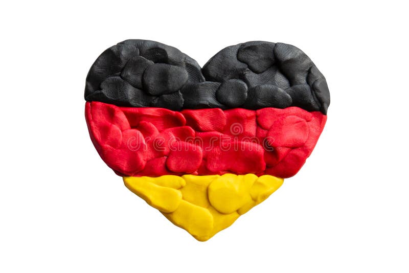 Heart shape of tricolour German flag plasticine modeling clay isolated on white background. Black, red and yellow flag of Germany