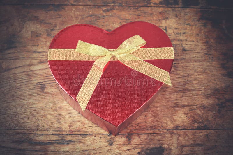 Heart shaped box on wood