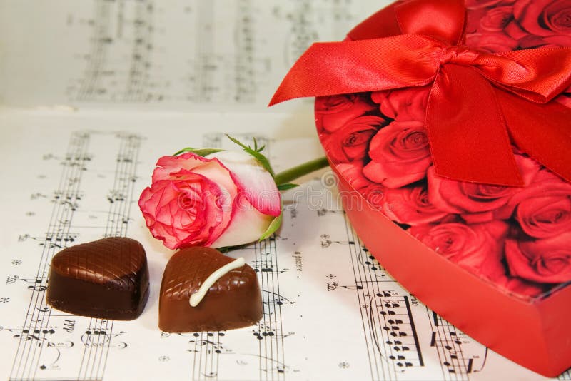 Heart Box of Chocolates with Rose Over Music Notes Stock Image Image