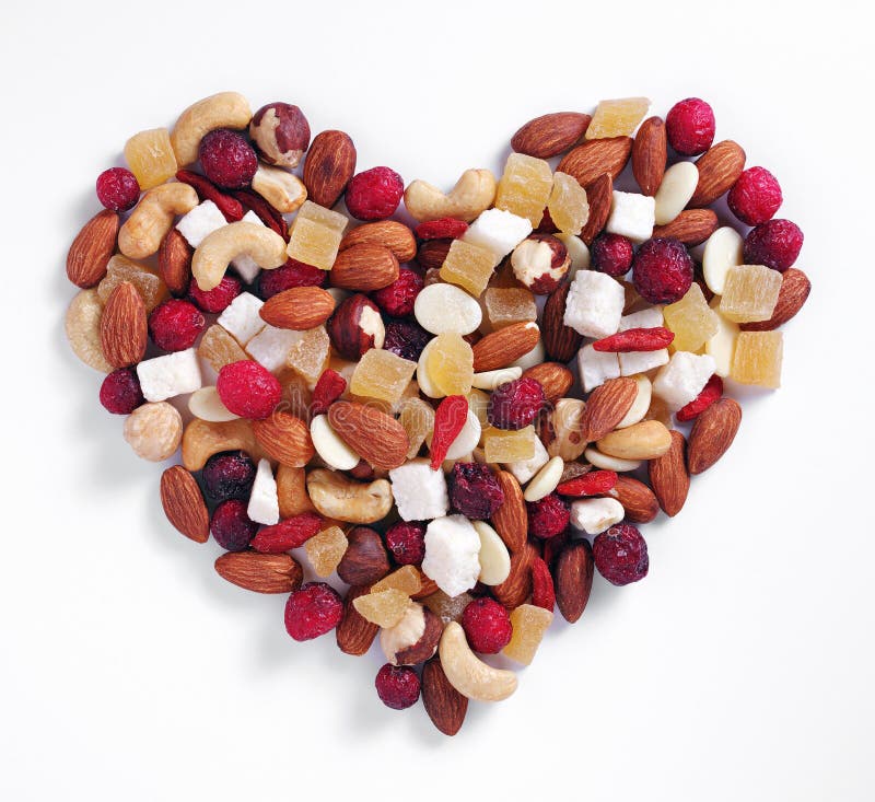 Heart shaped dried fruits stock photo. Image of rose 228243918