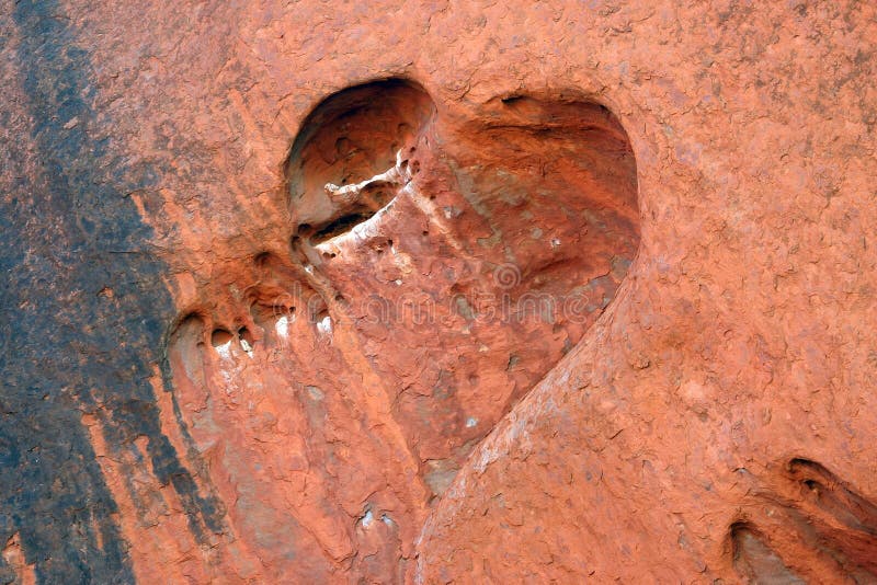 Heart shaped hole in rock