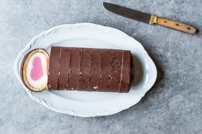 Heart Shaped Ice Cream Roll Cake with Vanilla and Chocolate. royalty free stock photos