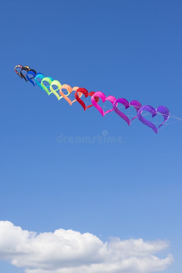 Heart Shaped Kites in the Blue Sky. Vertical Shot Stock Image - Image of colors, shaped: 192672855 Heart Shaped Kites in the Blue Sky. Vertical Shot Stock Image - Image of colors, shaped: 192672855