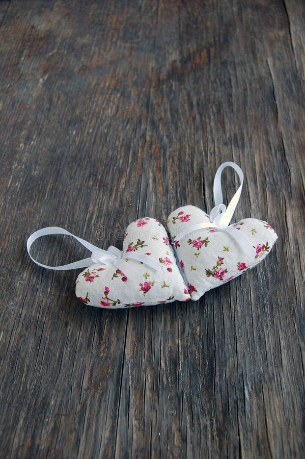 Heart shaped lavender bag on wooden table