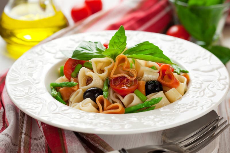 Heart-shaped pasta with vegetables