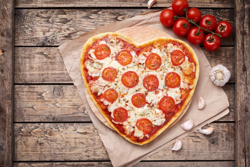 Heart Shaped Pizza Margherita with Tomatoes Stock Photo - Image of ...