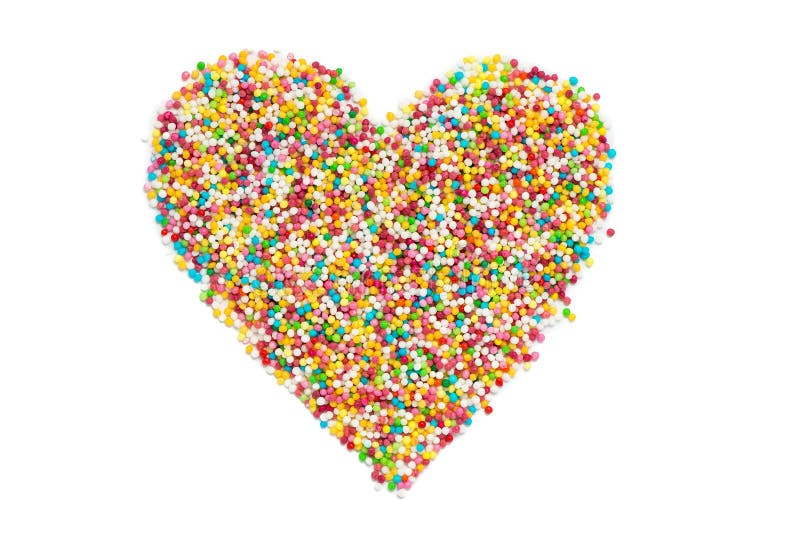 Colorful sprinkle dots in a shape of heart, isolated over white background. Colorful sprinkle dots in a shape of heart, isolated over white background