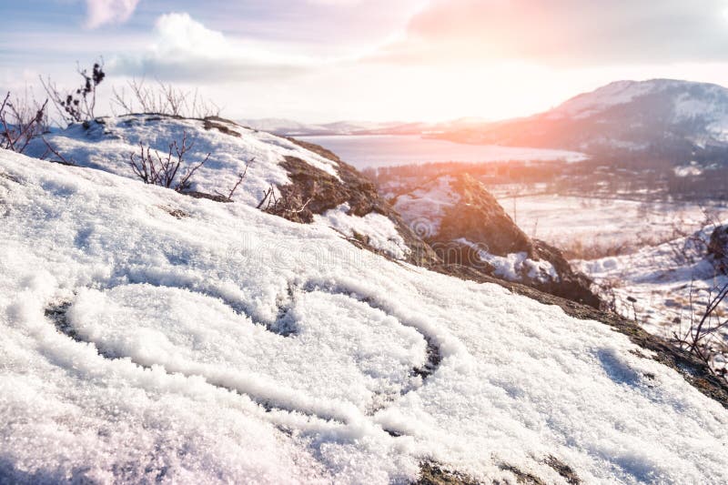 Cuore sul la neve.