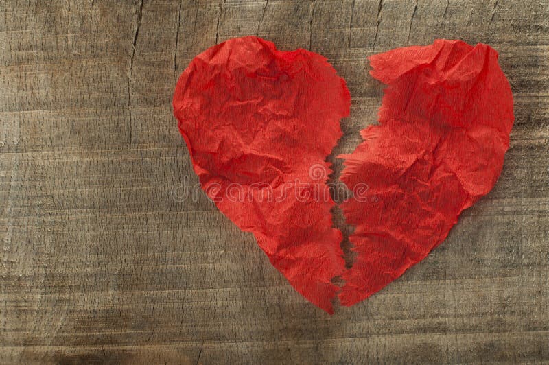 Heartbreak made â€‹â€‹of curled red paper