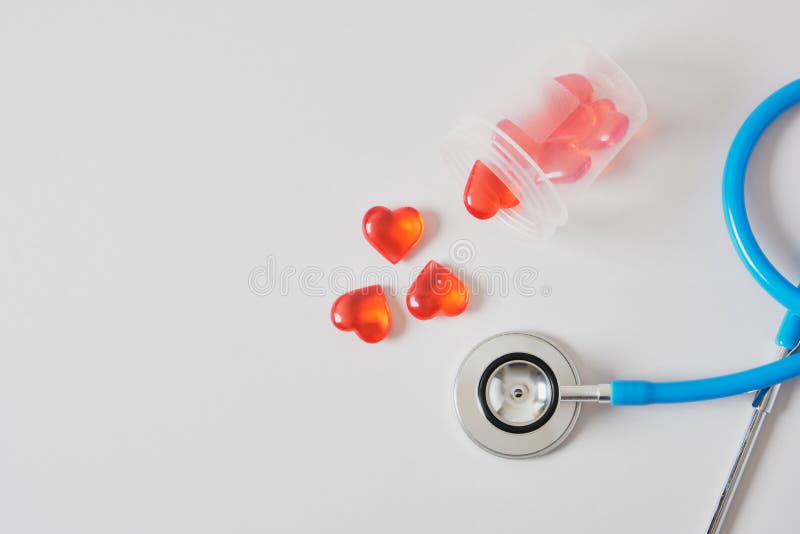 hearts in a jar for tests and medical stethoscope, sperm and egg donation, artificial insemination and surrogacy concept