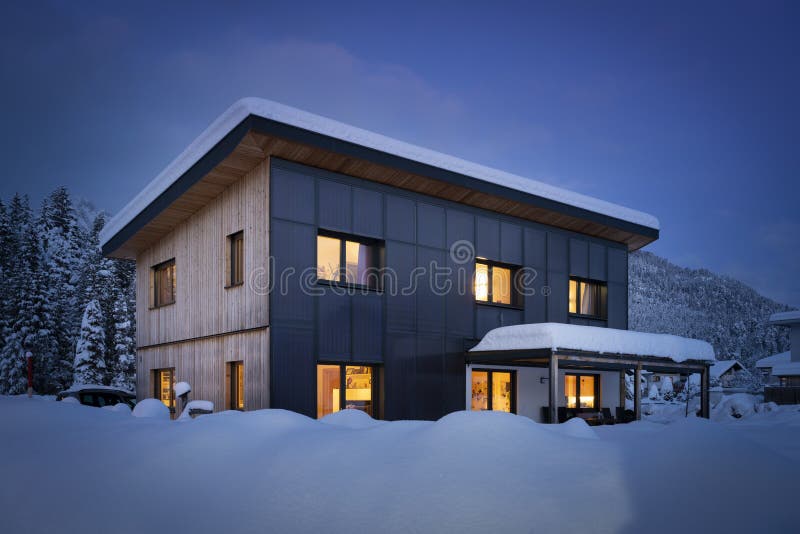 Heat energy self-sufficient single-family house in the snow-covered winter with solar thermal collectors