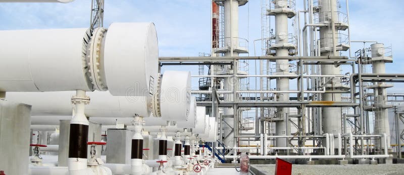 Heat exchangers in a refinery. The equipment for oil refining stock photography Heat exchangers in a refinery. The equipment for oil refining stock photography