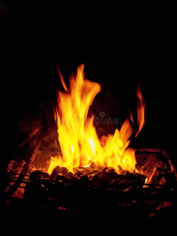 Heat and Fire Energy. Textured Flames in Fireplace Stock Photo Image