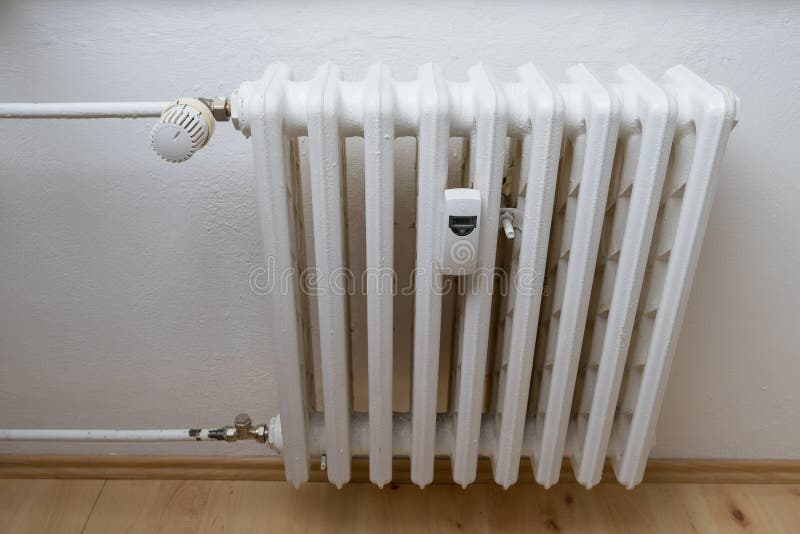 Heating Radiator with Heat Meter and Valve for Regulation Stock Image