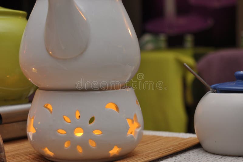 Heating Tea Kettle, Teapot Standing Over the Fire. Stock Photo Image