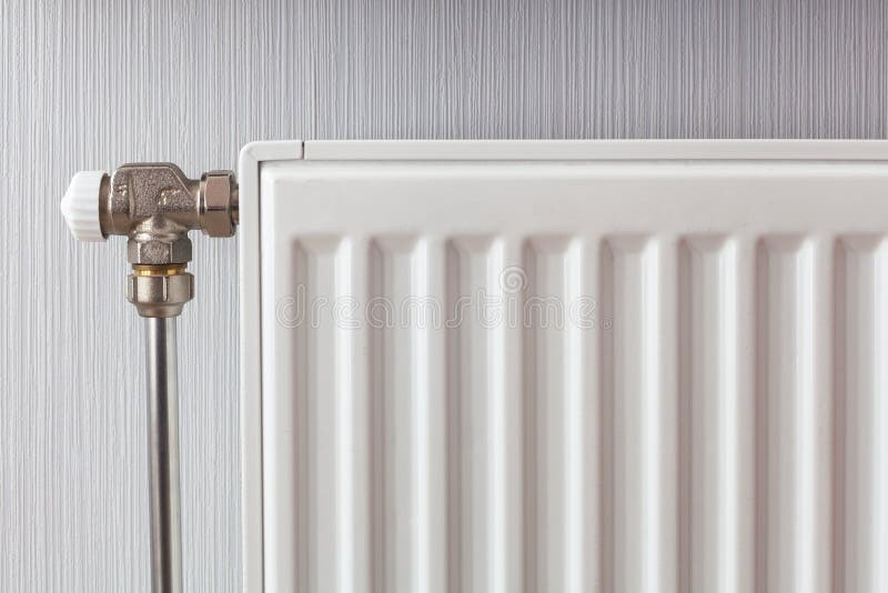 Heating White Radiator with Adjuster of Warming in Living Room Stock