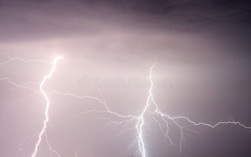 Heavy clouds bringing thunder lightnings and storm stock photography