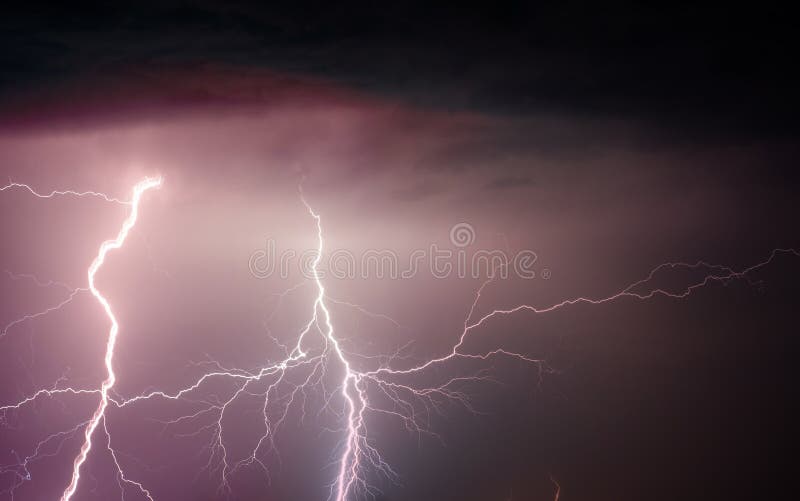 Heavy clouds bringing thunder lightnings and storm stock photography