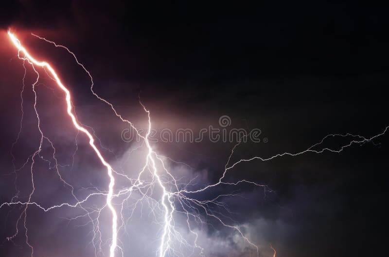 Heavy clouds bringing thunder, lightnings and storm stock image