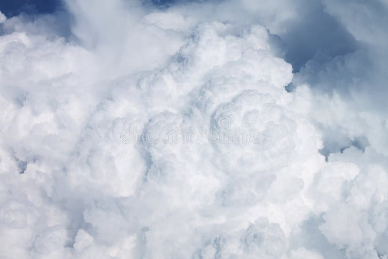 Heavy clouds out of an airplane window royalty free stock photo