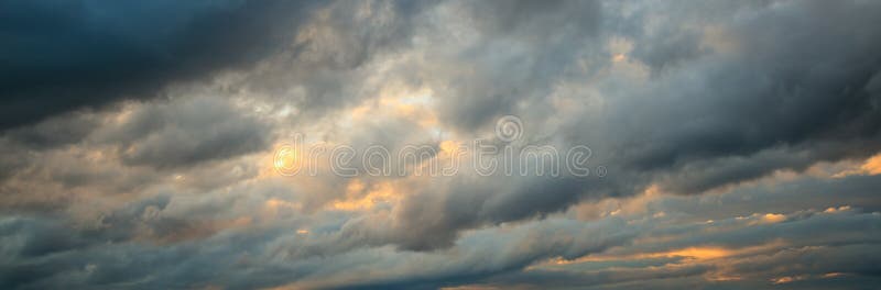 Heavy clouds over mountains stock image