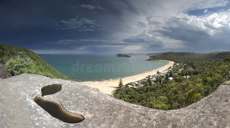 Heavy clouds over Pearl Beach Central Coast Australia stock images